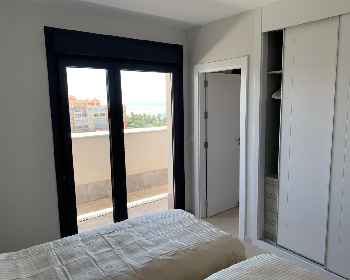 Penthouse With Wide Terrace Next To The Ocean Apartment Huelva Bagian luar foto